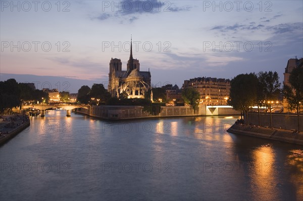 Notre-Dame de Paris
Scenic view of cathedral next to water at night.