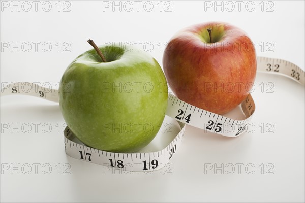 Apples and tape measure.