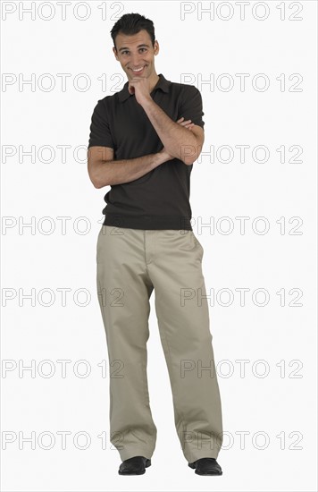 Studio shot of man smiling.