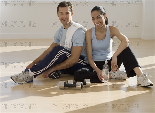 Portrait of couple at health club.