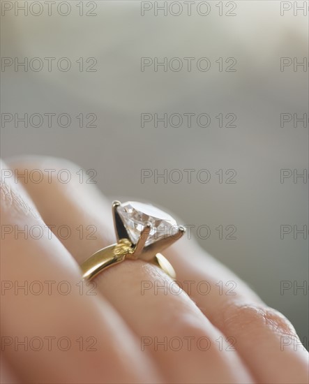 Close up of diamond engagement ring.