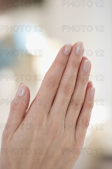 Close up of woman praying.