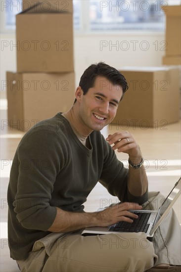 Portrait of businessman in new office.