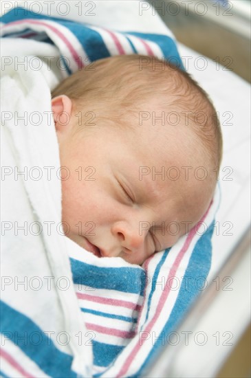 Close up of newborn baby sleeping.