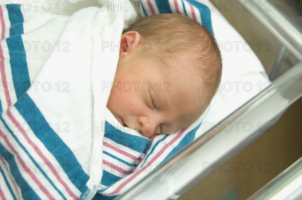 Close up of newborn baby sleeping.