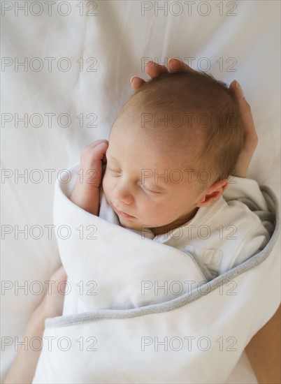Close up of newborn baby sleeping.