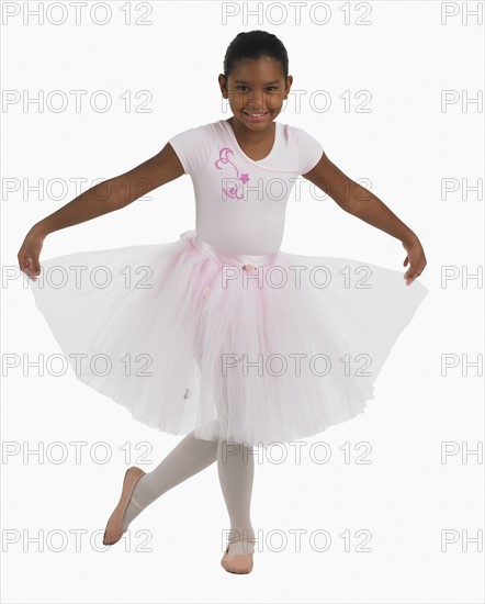 Studio shot of girl practicing ballet.