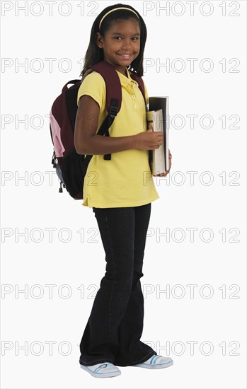 Studio shot of girl going to school.
