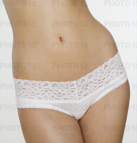 Close up of woman wearing lace underwear.