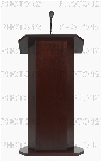 Studio shot of podium with microphone.
