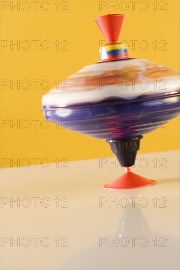 Closeup of spinning top.