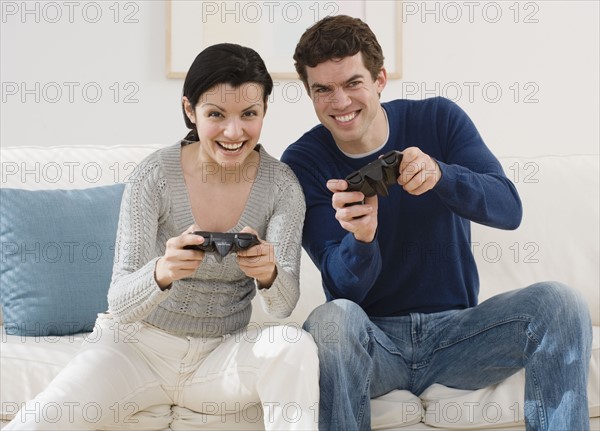 Couple playing video games.