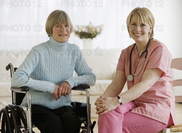 Portrait of nurse and senior woman.