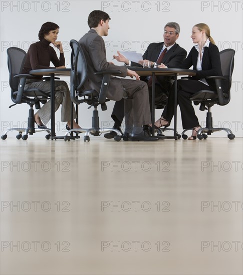 Group of businesspeople having meeting.