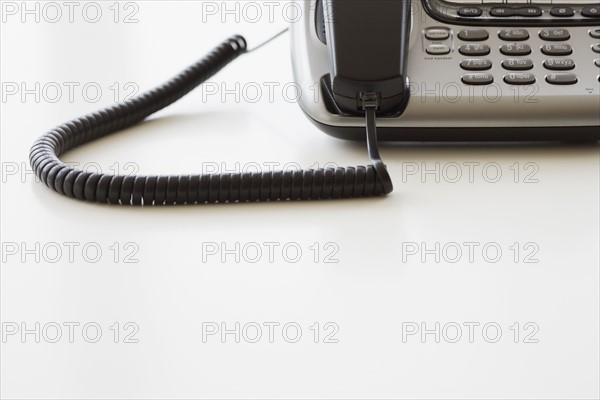 Close up of corded telephone.