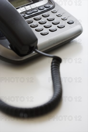 Close up of corded telephone.