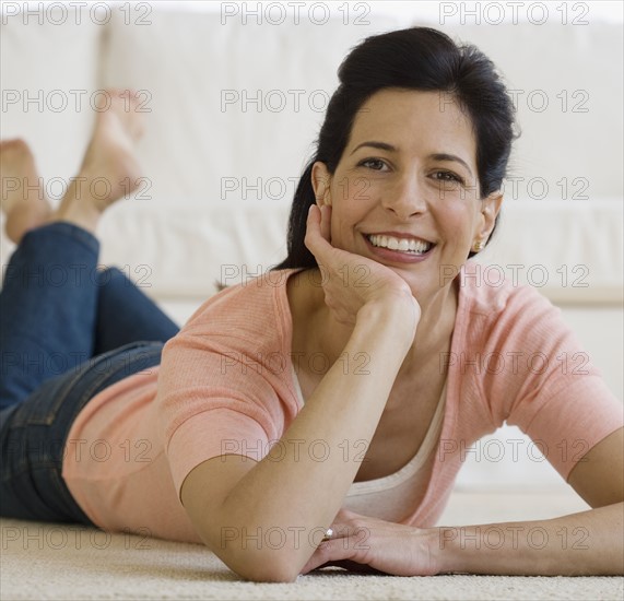 Woman laying on floor.