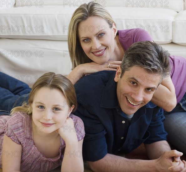 Portrait of family on floor.