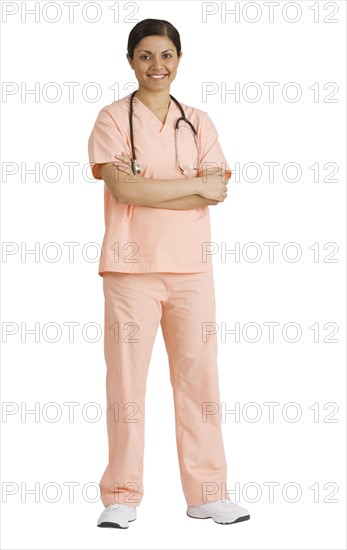 Indian female doctor with arms crossed.