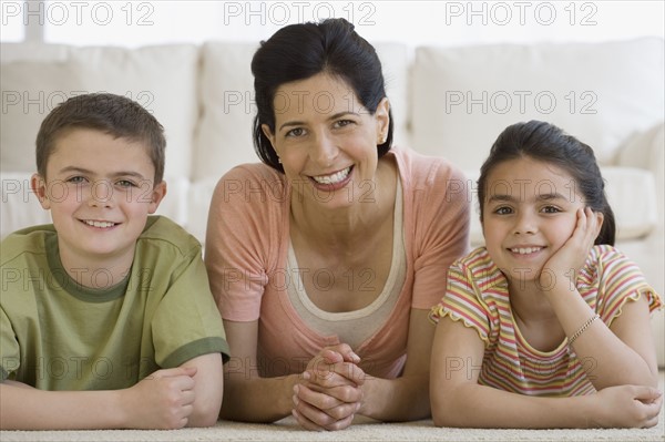 Portrait of mother and children.