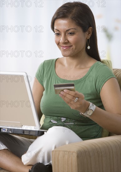 Indian woman shopping online.