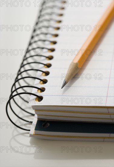 Close up of notepad and pencil.