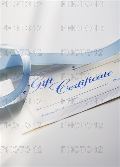 Close up of gift certificate and ribbon.