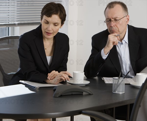 Businesspeople having teleconference.