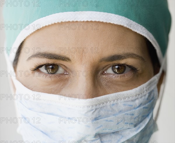 Close up of female doctor wearing surgical mask.