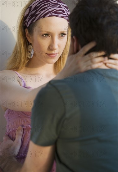 Woman looking at boyfriend.