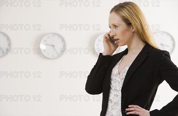 Businesswoman talking on cell phone.