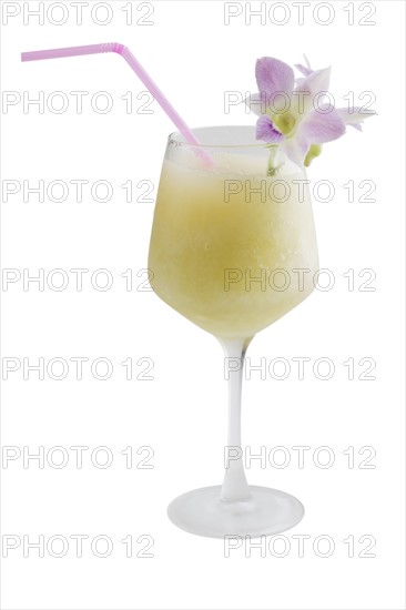 Blended cocktail with straw and flower.