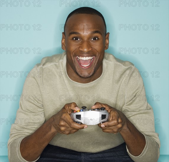 Man playing video games.