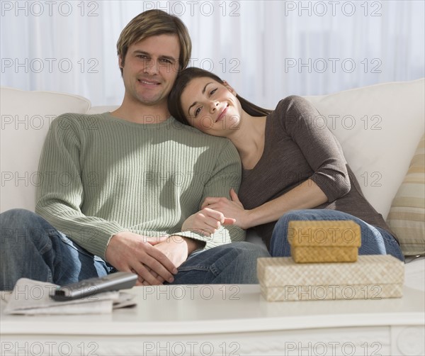 Couple watching television.