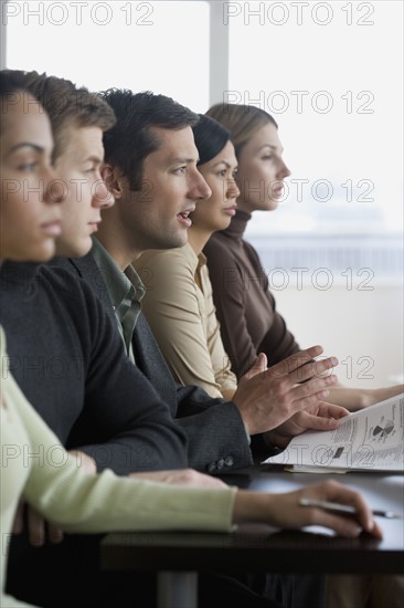 Group of businesspeople at meeting.