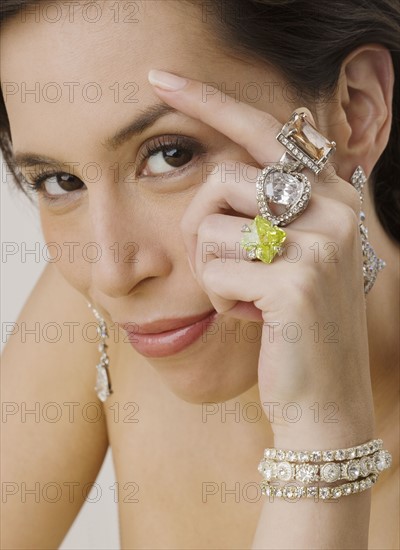 Portrait of woman wearing jewelry.