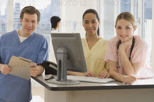 Portrait of young doctors in hospital.