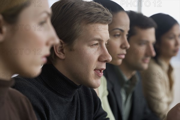 Group of businesspeople at meeting.