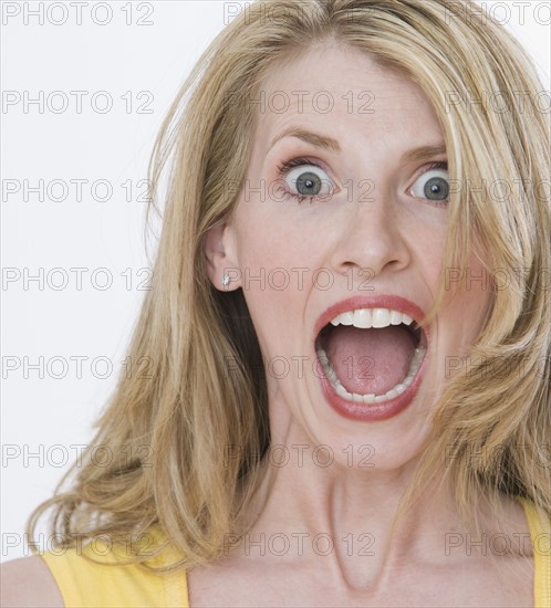 Close up of woman yelling.