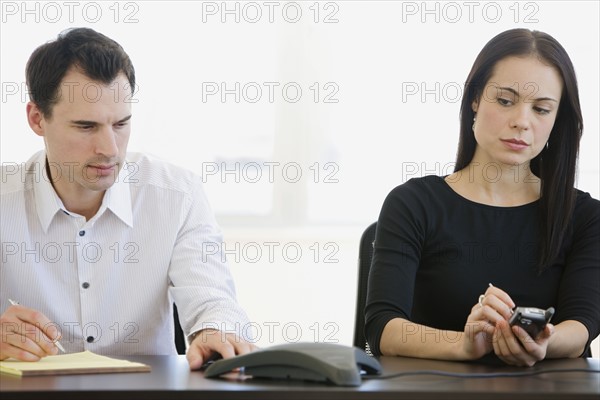 Businesspeople having teleconference.