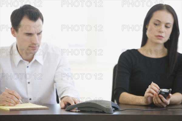 Businesspeople having teleconference.