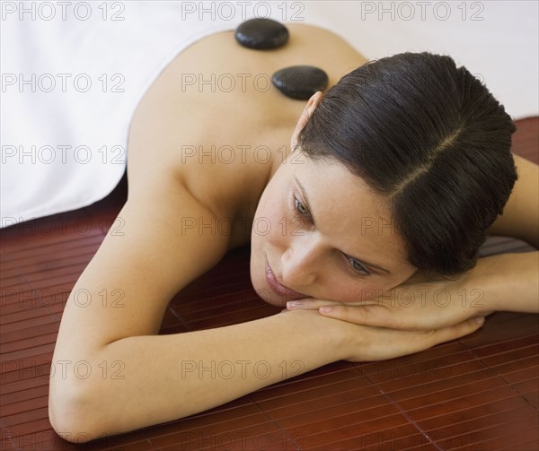 Woman receiving spa treatment.