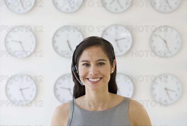 Businesswoman wearing headset.