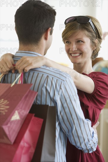 Couple smiling at each other.