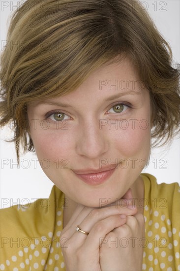 Close up of woman smiling.