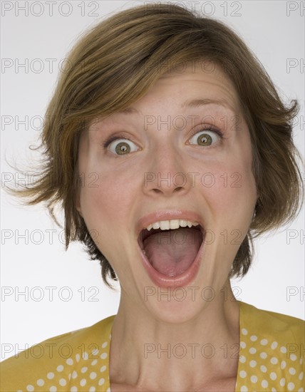Close up of woman yelling.