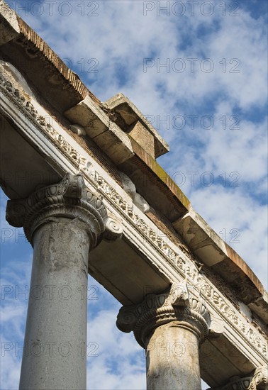 Ionic columns on Temple of Saturnus, Roman Forum, Italy.