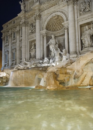 Trevi fountain and statues, Rome, Italy.