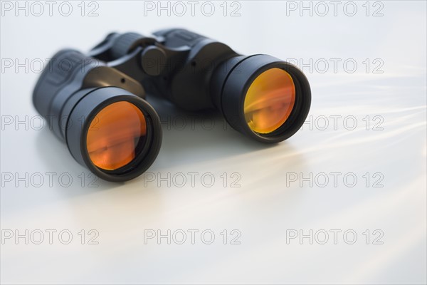 Binoculars on table.