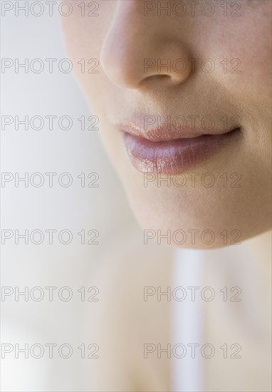 Close up of woman’s mouth.